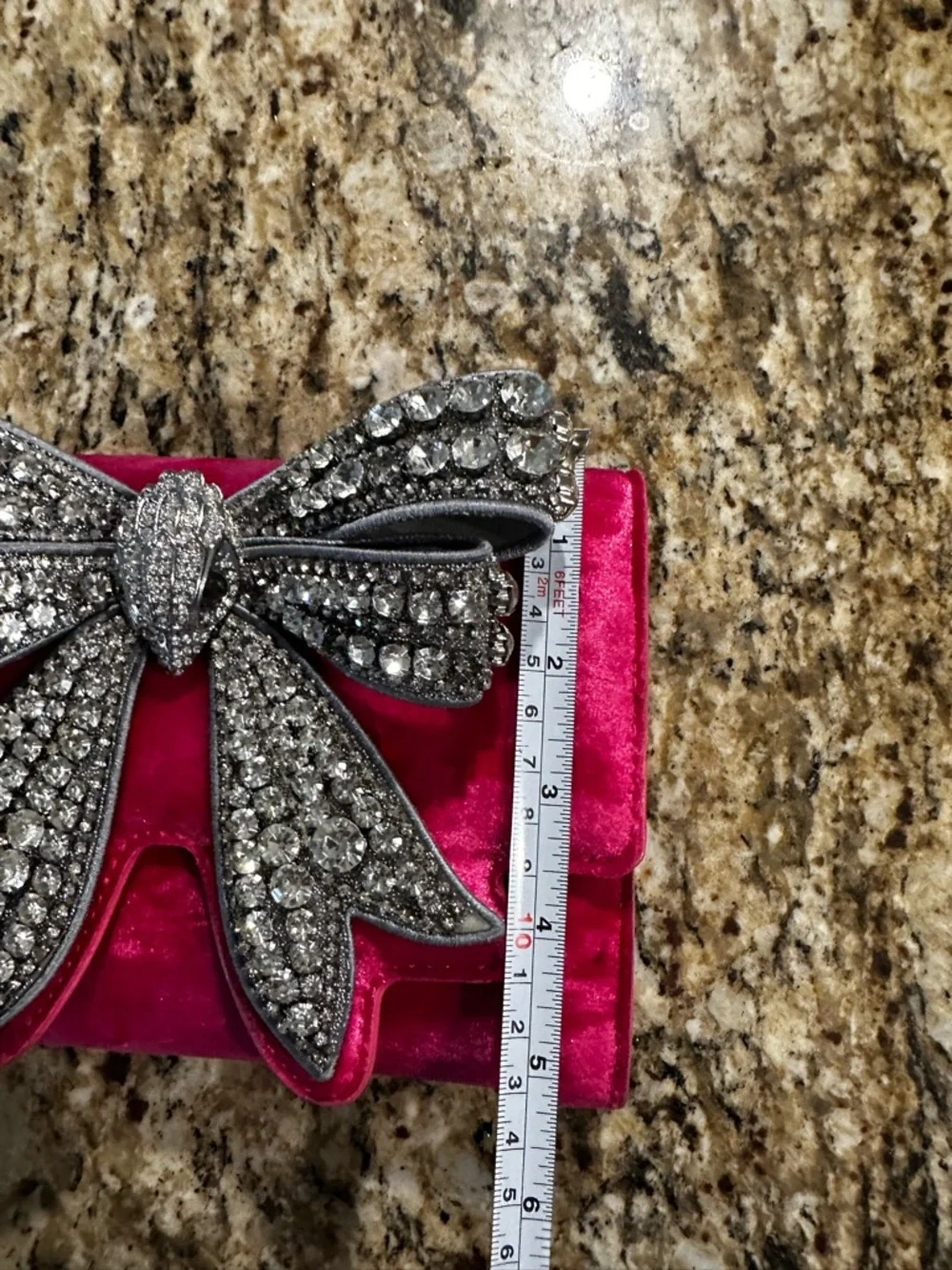 Kurt Geiger London Small Shoreditch Bow clutch in pink velvet. - Picture 6 of 16